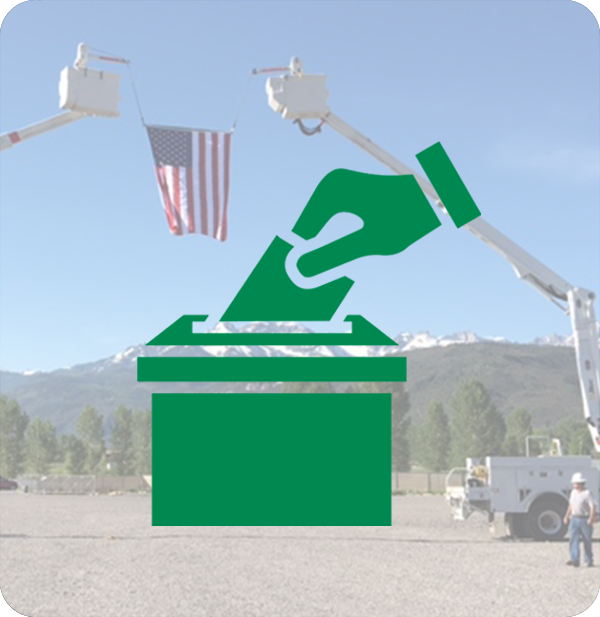 Ballot Box icon in front of the American Flag hoisted by bucket trucks