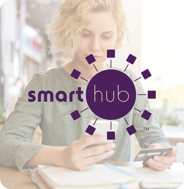SmartHub Logo in front of an elegant lady using her smart phone.